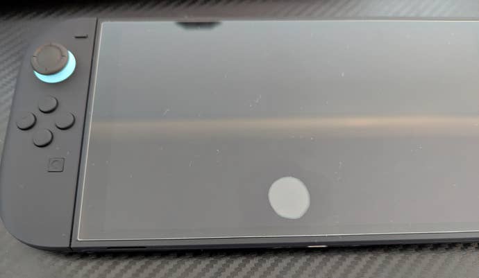 A Switch 2 with a screen protector issue.
