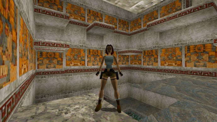 Lara Croft stands in a room of platforms all at different heights in the original Tomb Raider