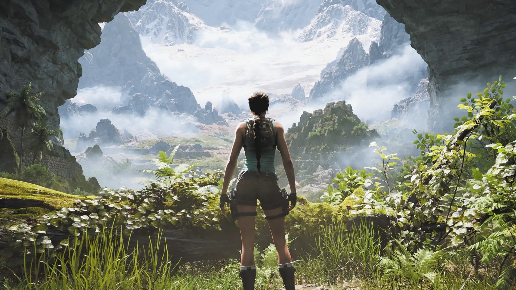 Tomb Raider Legacy of Atlantis image showing Lara Croft looking out over a vast lush landscape