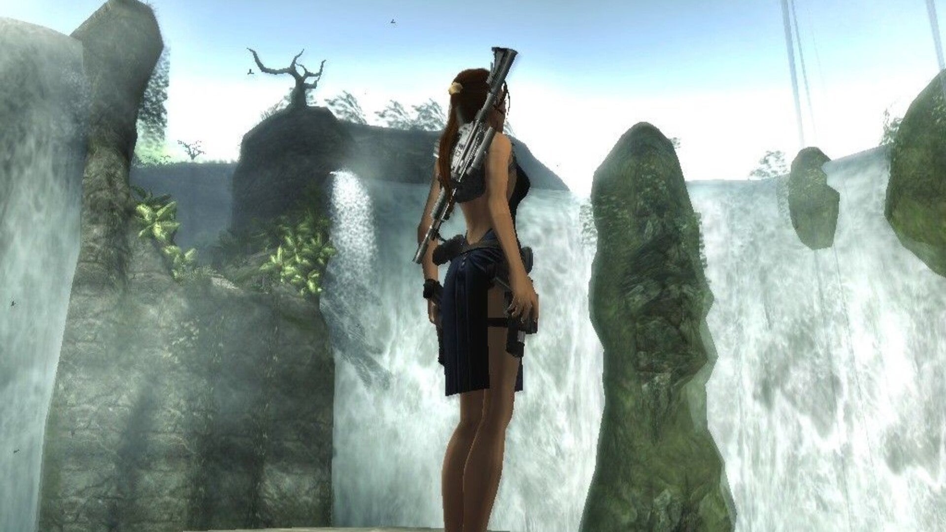 Lara Croft can be seen looking towards a waterfall in Tomb Raider: Legend