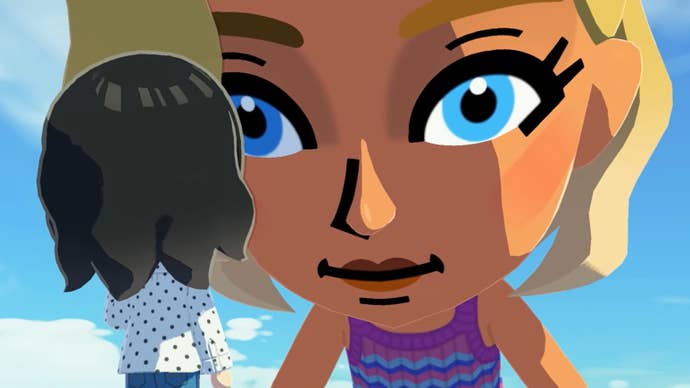 Tomodachi Life Living the Dream screenshot showing a large blue eyed female mii staring down at a small dark haired mii