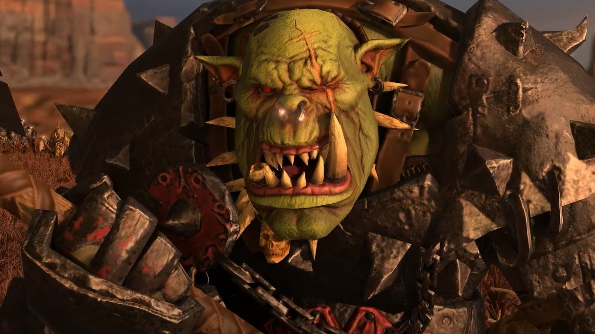 A screenshot from Total War Warhammer 3 showing an ork wielding a weapon - 1