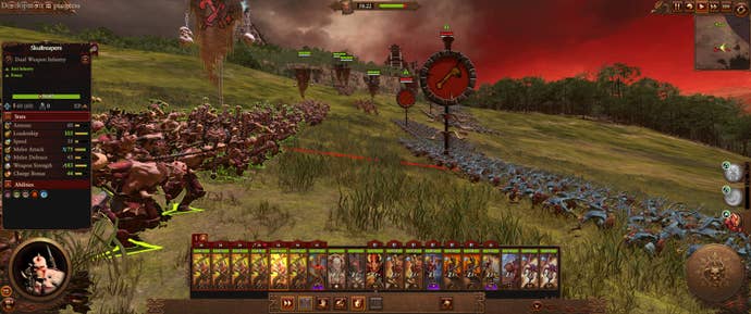 Khorne fights the lizardmen in Total War: Warhammer 3.