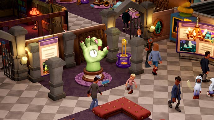 Multiple guests can be seen walking by a large hand statue in the Supernatural Museum in Two Point Museum