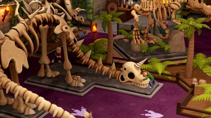 A schoolkid hugs a dinosaur skeleton in Two Point Museum.