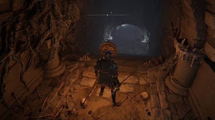 A skeleton inside the Deathtouched Catacombs in Elden Ring.