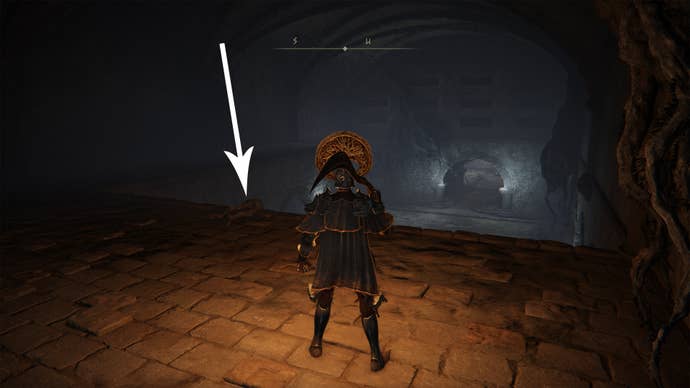 A body inside the Deathtouched Catacombs in Elden Ring.