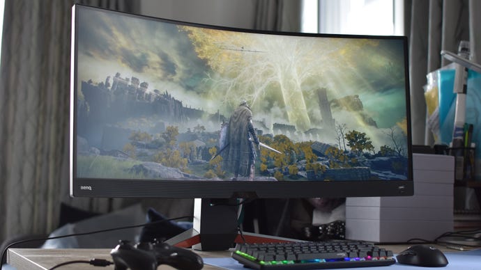 An ultrawide gaming monitor running Elden Ring, modified to display correctly at ultrawide resolutiuon.