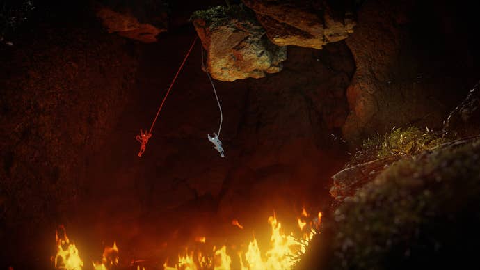 Two Yarnys can be seen jumping over a pit of fire in Unravel Two