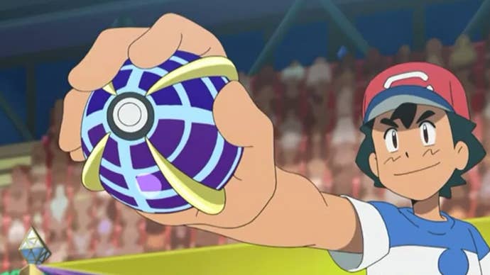 Ash Ketchum holds a Beast Ball.