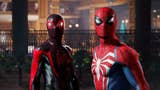 Peter Parker and Miles Morales stand together in Spidey suits in this image from Spider-Man 2.