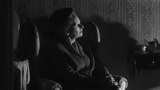 Maggie Thatcher sits in Downing Street in this still from the Call of Duty: Black Ops 6 teaser trailer.