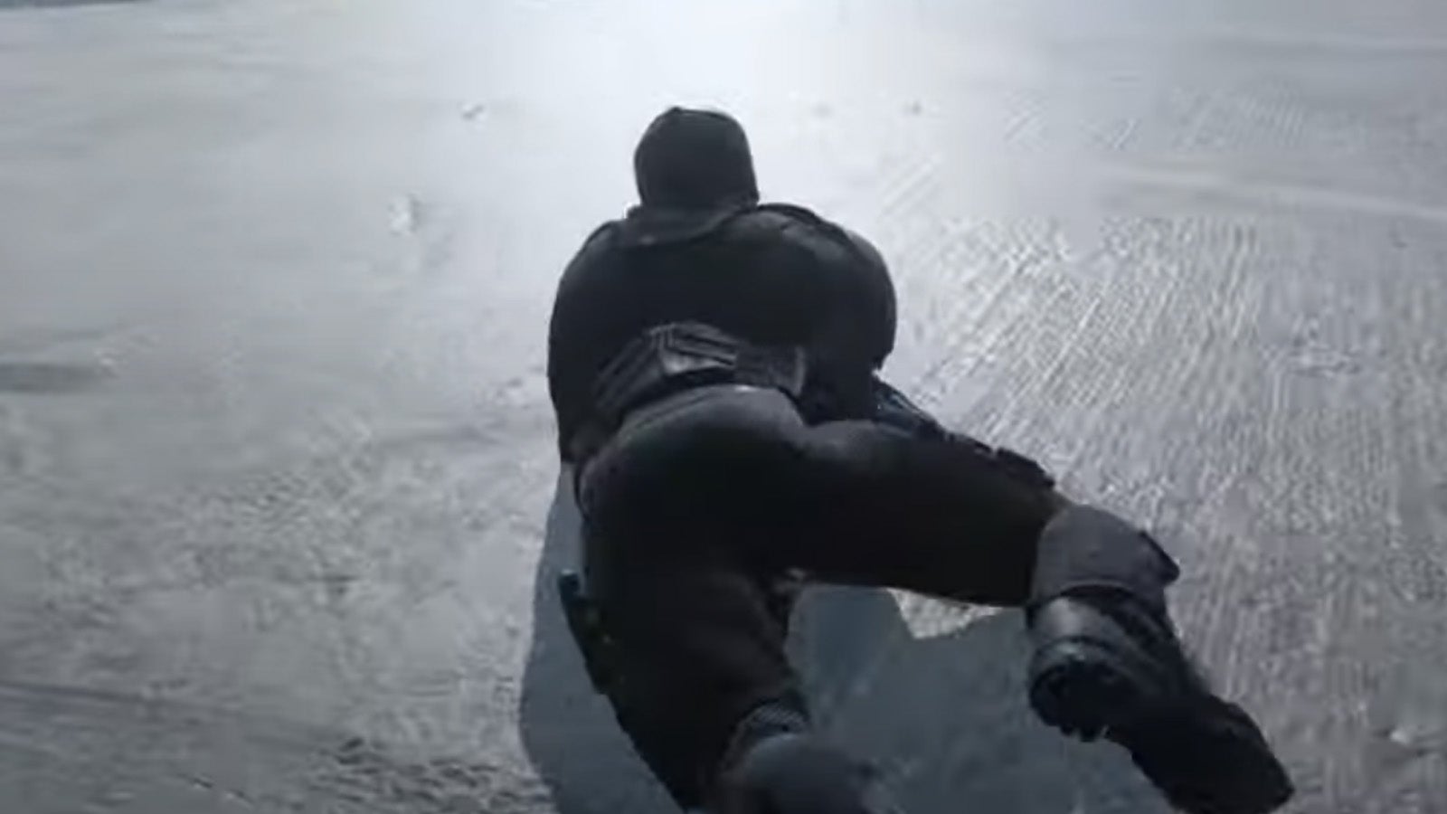 A Call of Duty: Modern Warfare 3 player wriggles quickly along the ground using the game&rsquo;s snaking exploit.