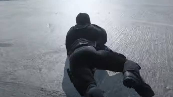 A Call of Duty: Modern Warfare 3 player wriggles quickly along the ground using the game’s snaking exploit.