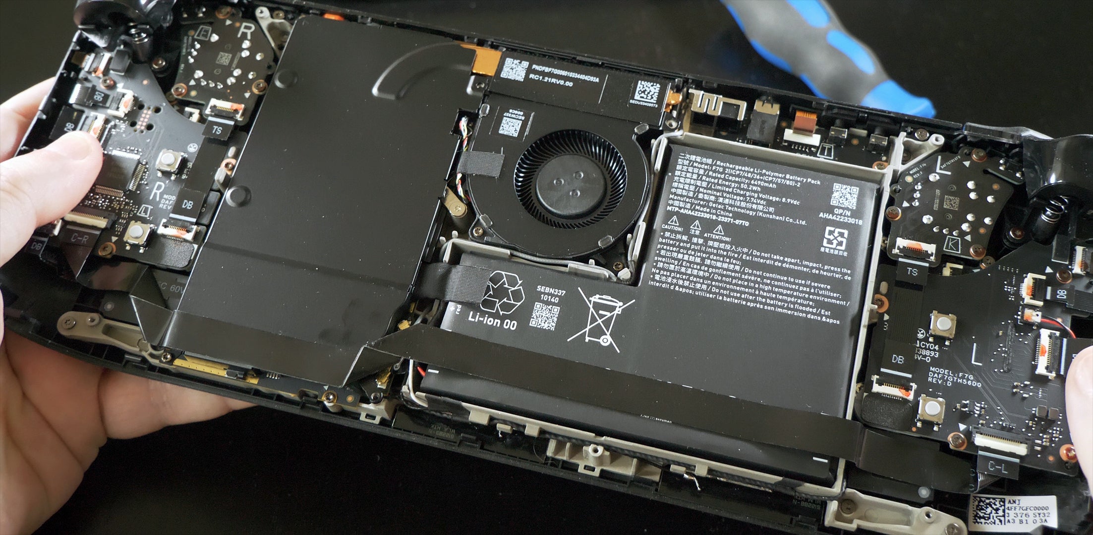 An internal shot of the new Steam Deck OLED, showing its larger fan and 50WHr battery.