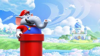 Elephant Mario pops out of a warp pipe in Super Mario Bros. Wonder.
