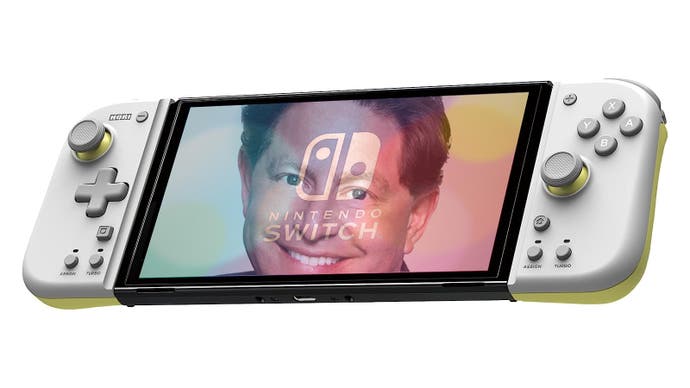 Activision boss Bobby Kotick peers out from within a Nintendo Switch with Hori Joy-Con attached.