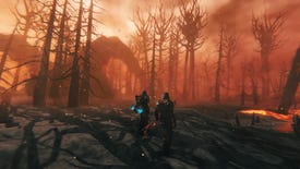 Players wander a volcanic landscape in Valheim