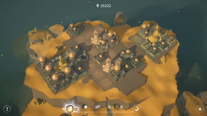 A large settlement on top of a yellow grass cliff face in Urbo