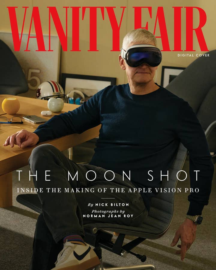 Vanity Fair digital cover showing Tim Cook sitting at a desk wearing the Apple Vision Pro headset. The headline says "The Moon ShotL Inside the Making of the Apple Vision Pro"