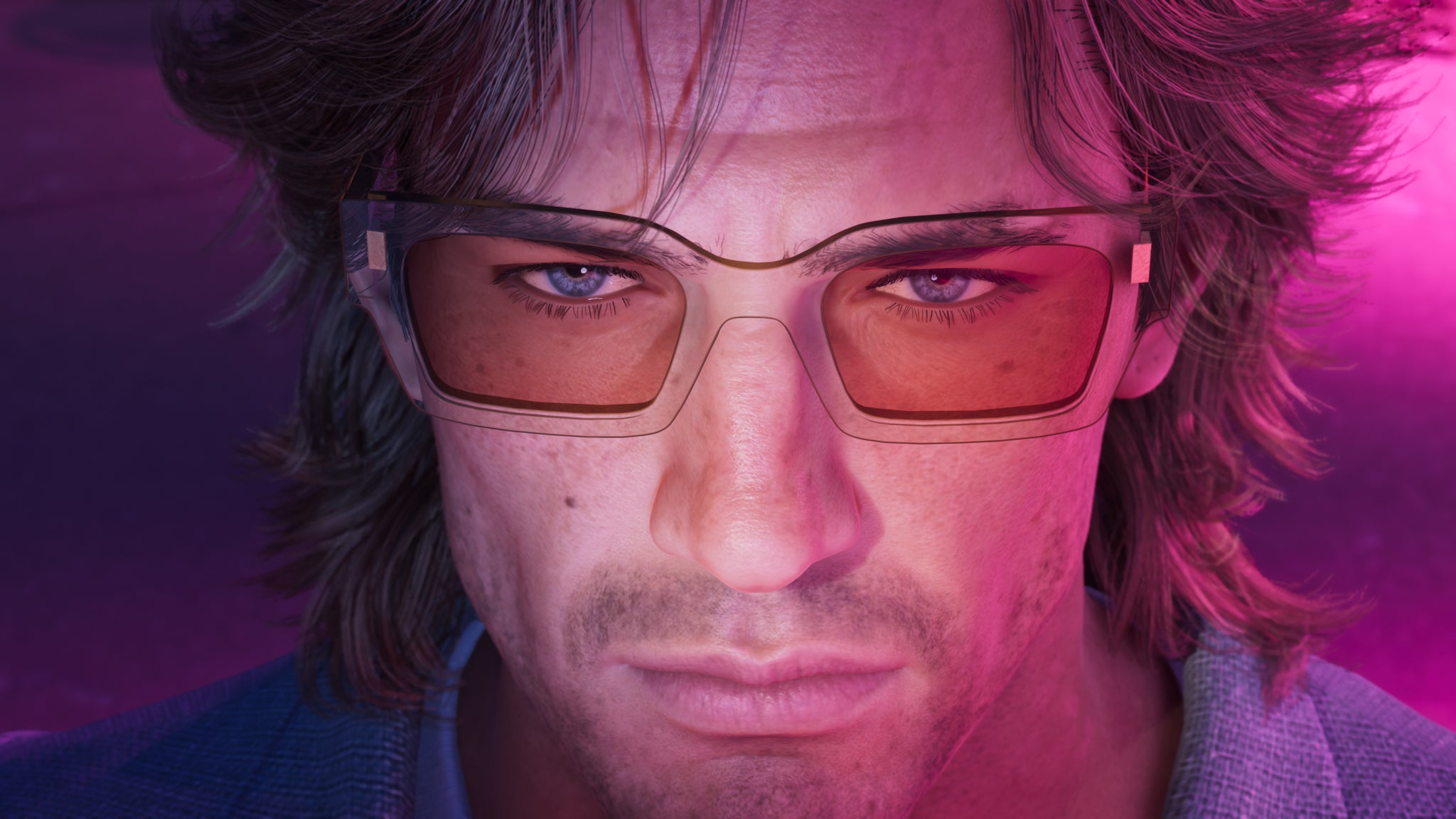Official GTA 6 image showing Jason looking at the camera in close up with long shaggy hair and retro sunglasses
