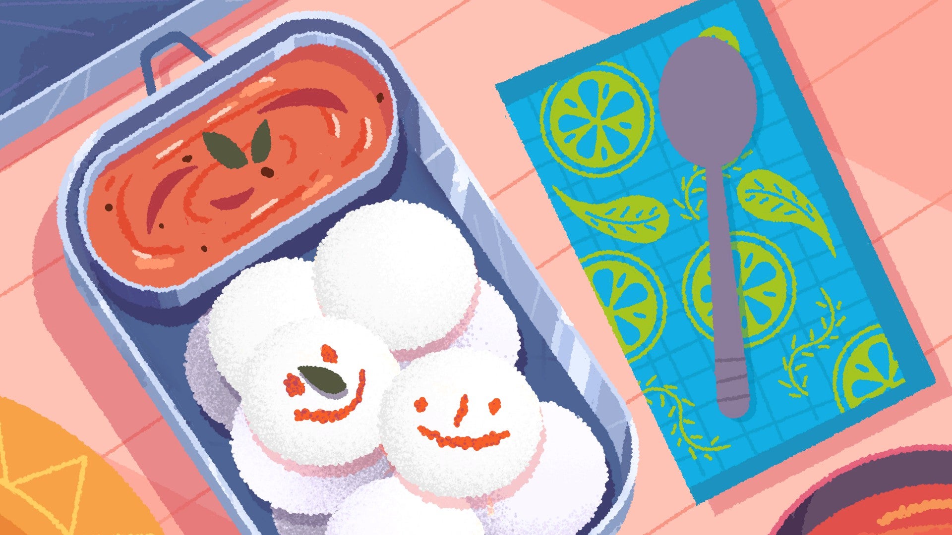 A packed lunch sits on a table. There are idli packed into the box with smiley faces careful drawn on them in a brown sauce in Venba