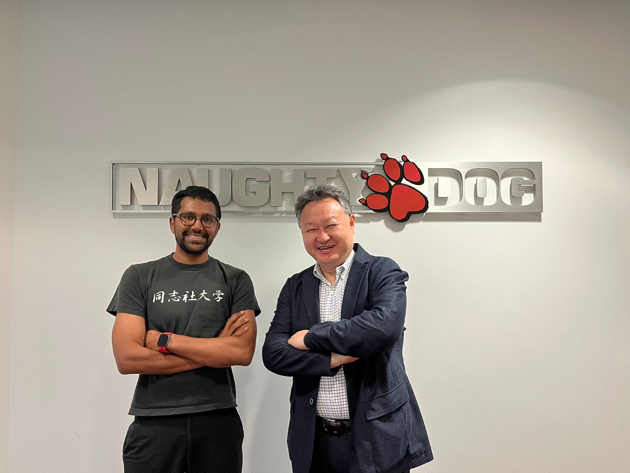 Vinit Agarwal with Shuhei Yoshida at Naughty Dog in 2022