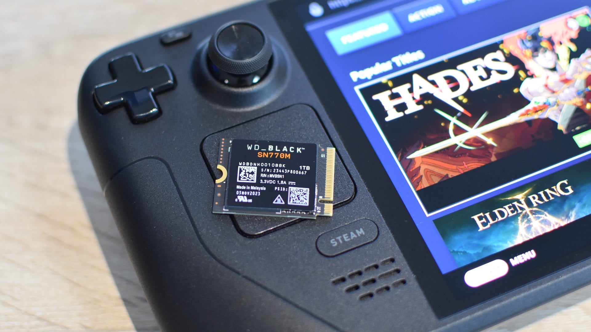 The WD Black SN770M SSD sitting on top of a Steam Deck OLED. - 5