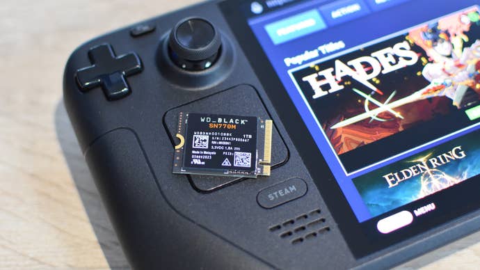 The WD Black SN770M SSD sitting on top of a Steam Deck OLED.
