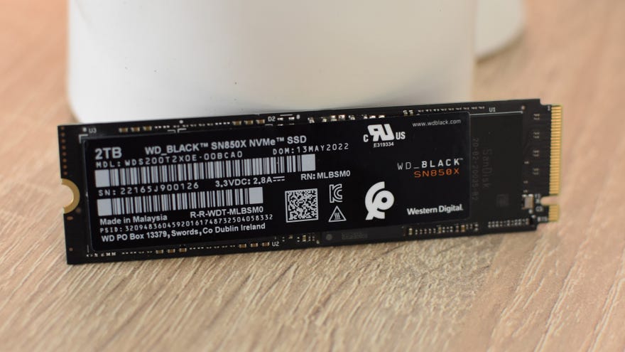 The WD Black SN850X SSD propped up on a desk.