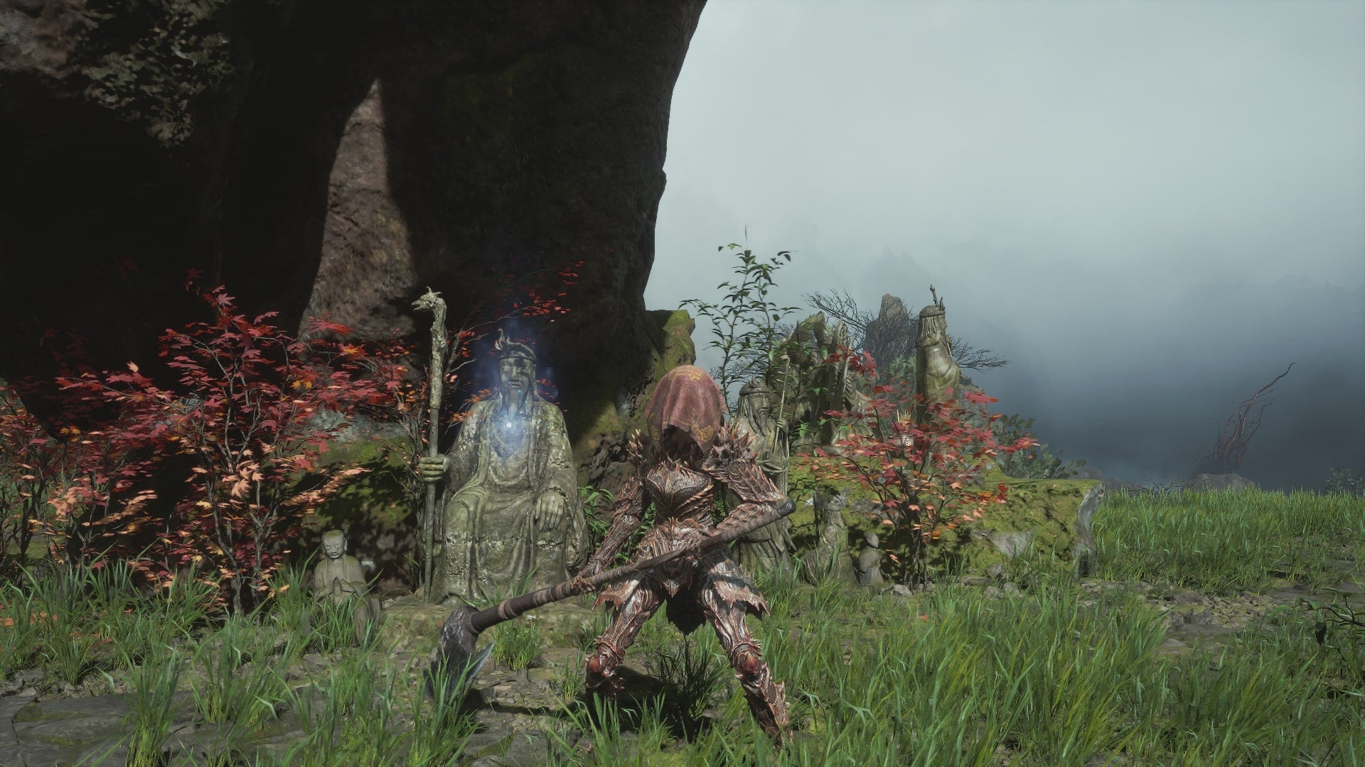 The player  stands beside a glowing blue clue - known as Faces of the Past - atop a hill beside Shu Sanctum in WUCHANG: Fallen Feathers - 1