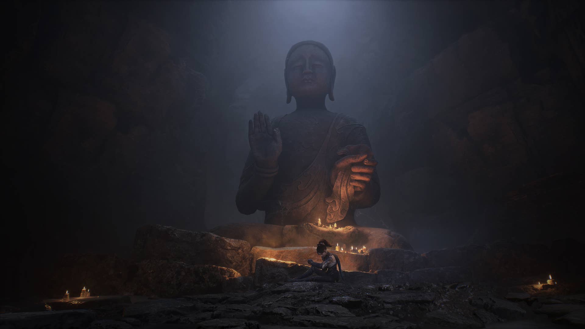 Woaching can be seen waking up in front of a Buddhist statue near Buddhist cliffs: Falling feather