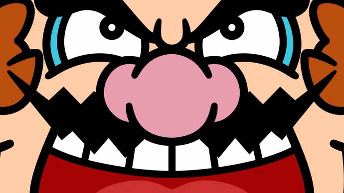 A close-up of Wario’s big, horrible face.