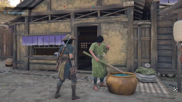 Naoe looking at a merchant in Assassin’s Creed Shadows.