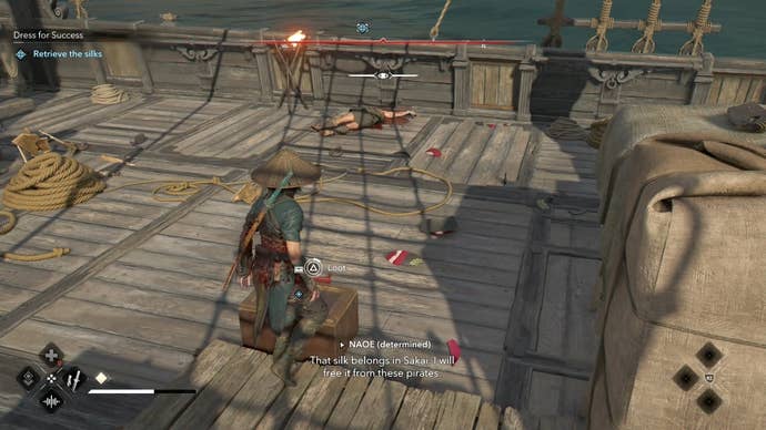 Naoe looking at a box on a ship in Assassin’s Creed Shadows.
