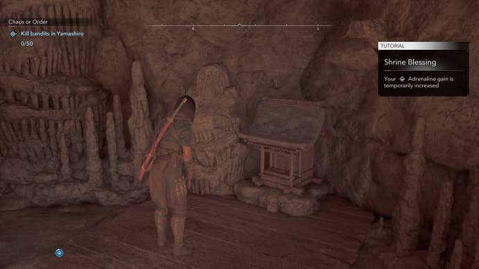 Naoe praying at a Shrine in Assassin’s Creed Shadows.