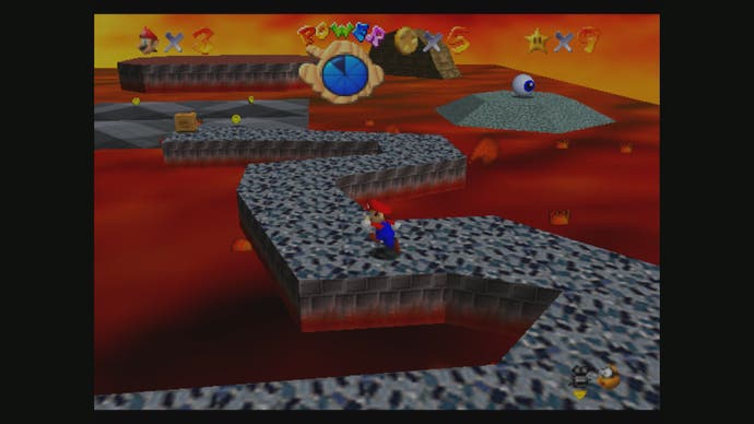 Best Mario Games - Super Mario 64 screenshot showing mario running on a cobbled path through lava.