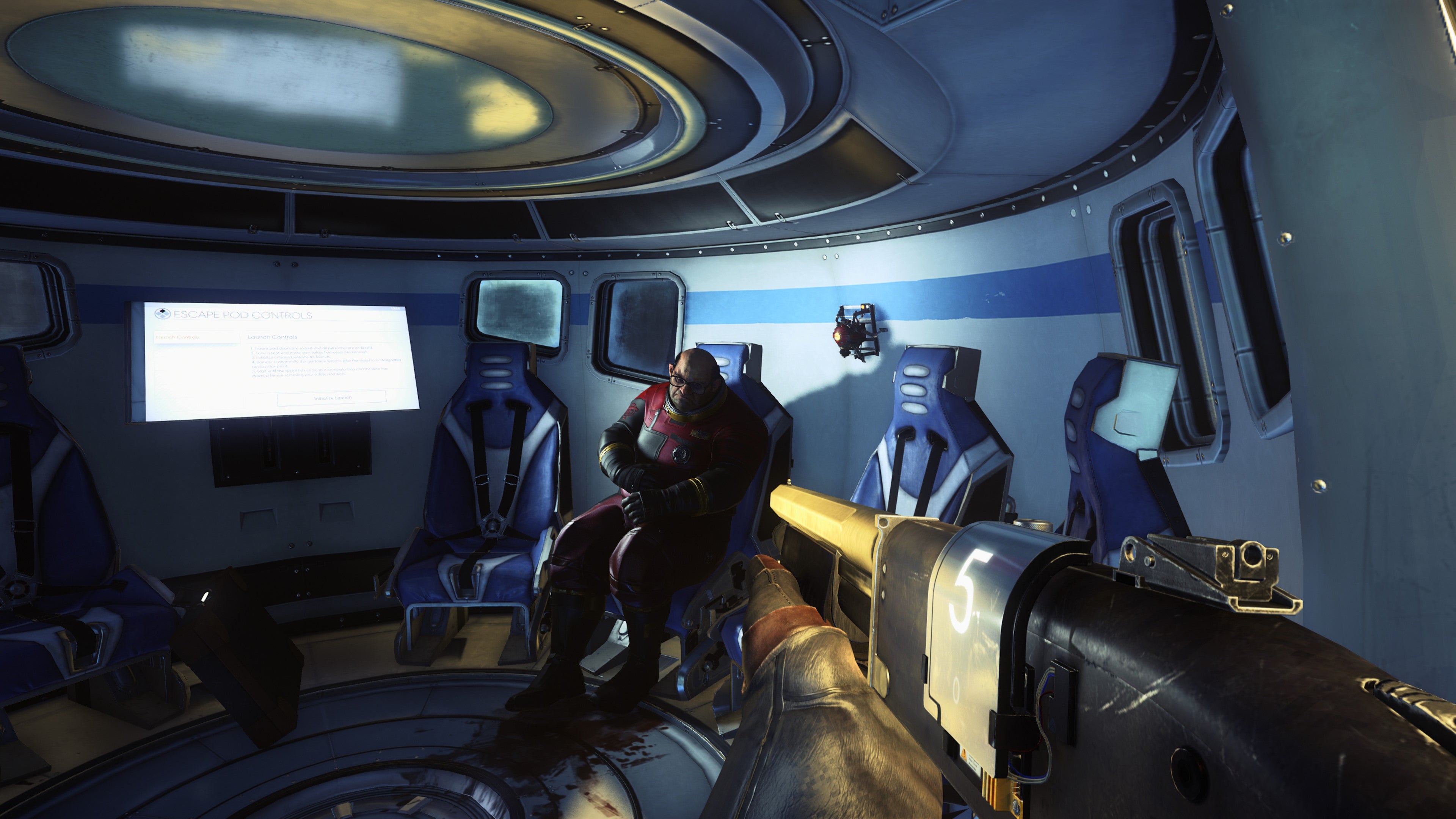 A man lies slumped inside a pod in Prey (2017).