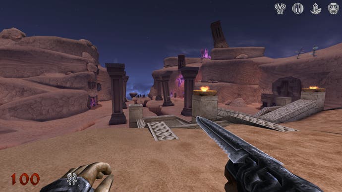 A screenshot of Wrath: Aeon of Ruin, depicting a rugged desert landscape with a row of crooked pillars running down the centre.