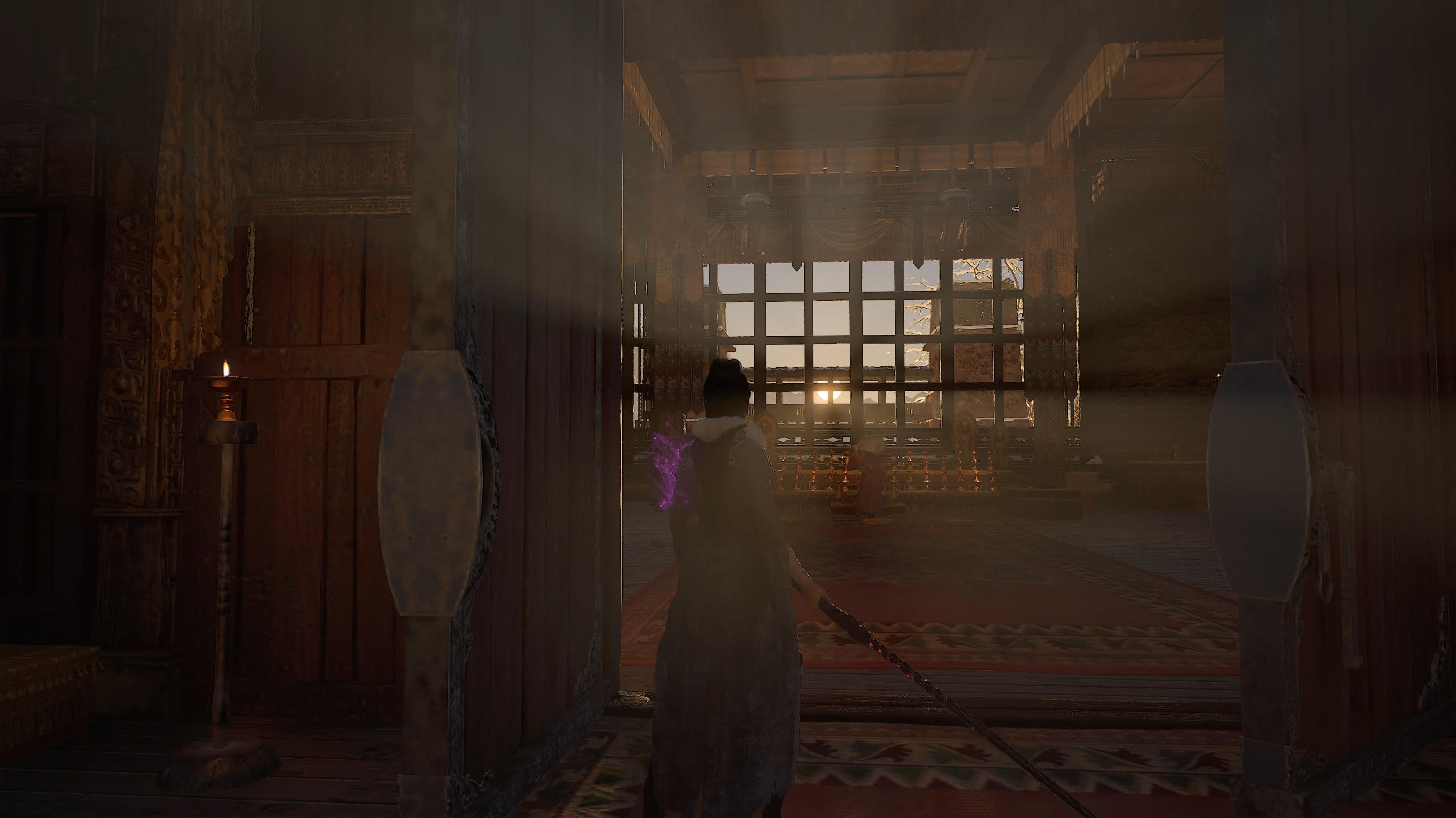 In a screenshot from Wuchang Fallen Feathers, Wuchang enters a large, red-adorned hall with a setting sun coming through the windows.