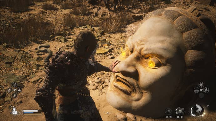 The player approaches a Buddha Head, where they can retrieve the Buddha's Eyeballs, in Black Myth Wukong