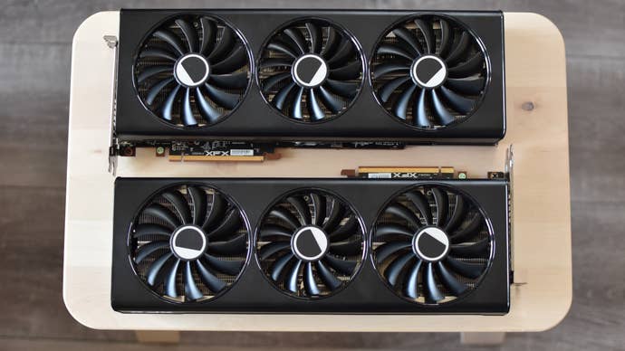 The XFX Speedster QICK 319 Radeon RX 7700 XT Black Edition and XFX Speedster QICK 319 Radeon RX 7800 XT Core Edition graphics cards on a small table.