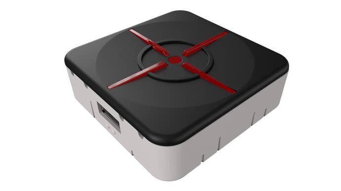 The XIM Matrix adapter against a white background.