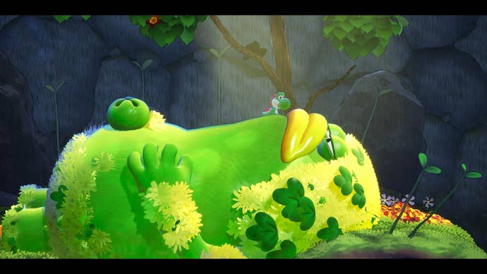 Yoshi and the Mysterious Book screenshot showing giant green creature with massive belly button