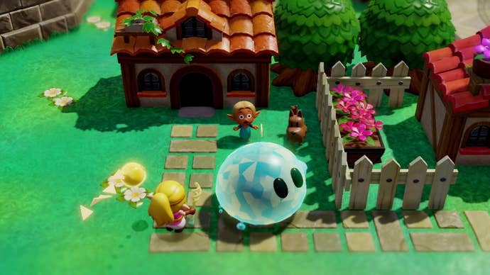 Zelda beside a giant Hydrozol and a child with a dog in Zelda Echoes of Wisdom.