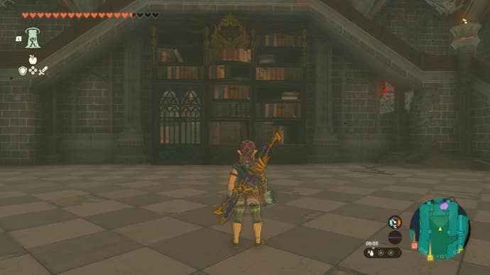 Link faces a bookcase in the Hyrule Castle Library in The Legend of Zelda: Tears of the Kingdom