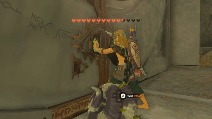 Link opens a door powered by Heart Containers in The Legend of Zelda: Tears of the Kingdom