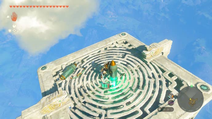 Link stands atop a floating platform with a rocket in Zelda: Tears of the Kingdom