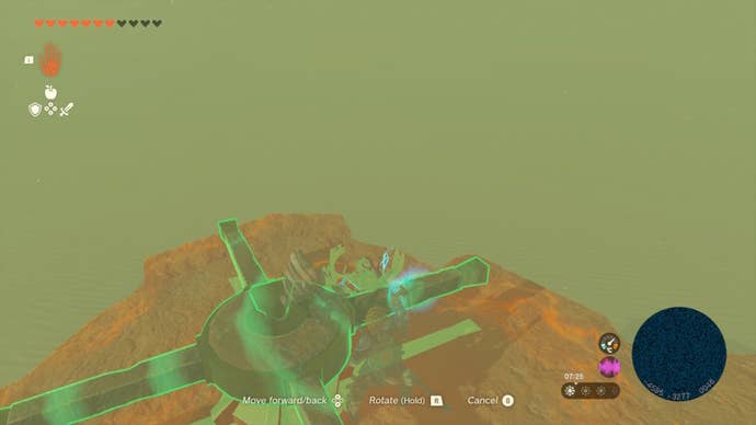 Link uses Ultrahand to move a wheel atop a pillar in The Legend of Zelda: Tears of the Kingdom
