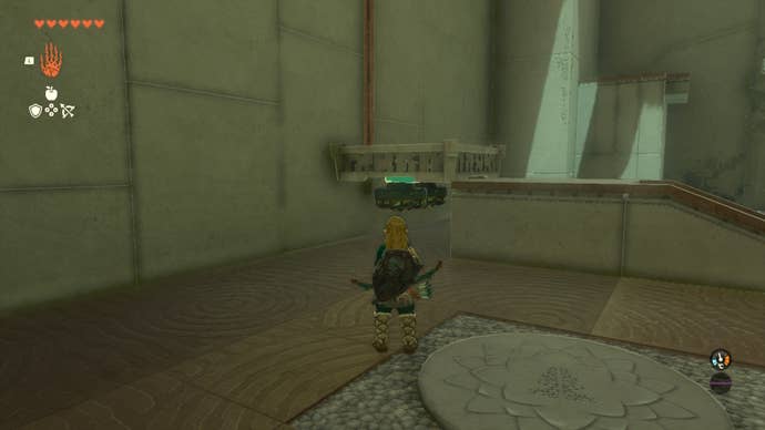Link looks at a platform with two fans attached to it in the  Ishodag Shrine in The Legend of Zelda: Tears of the Kingdom